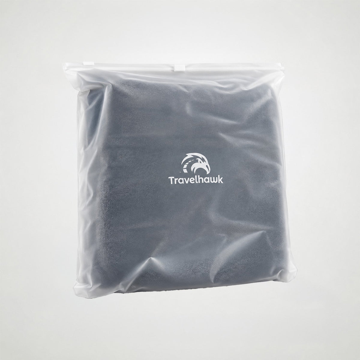 De droogdoek in de verpakking met Travelhawk-logo