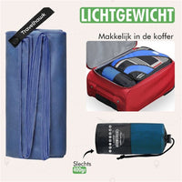 compacte travelhawk handdoek opgerold in reistas
