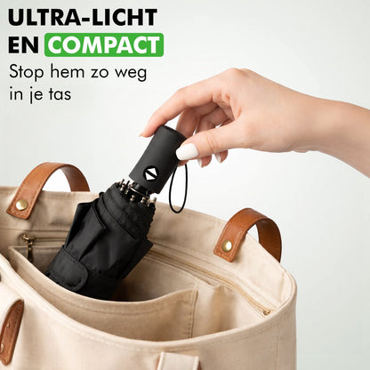 paraplu met beschermhoes compact opgeborgen